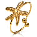 Anillo "Estrella de mar", acero chapado en oro de 18 quilates